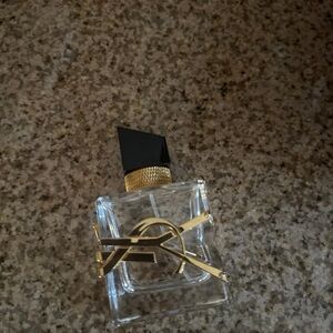 Yves Saint Laurent Black and Gold Perfume Bottle